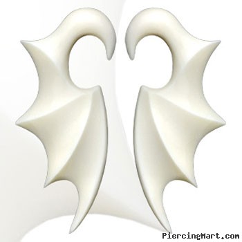 Pair of Hand  carved buffalo bone bat wing tapers